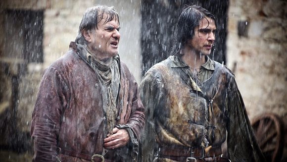 d'Artagnan et son p&egrave;re sous la pluie