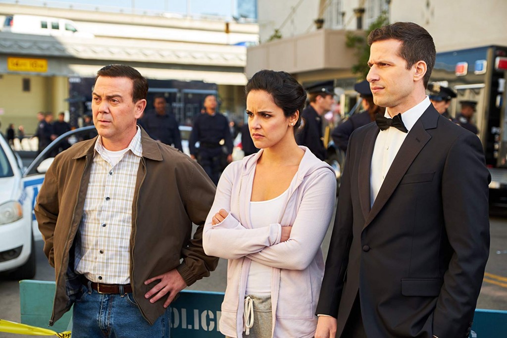 Charles (Joe Lo Truglio), Amy (Melissa Fumero) & Jake (Andy Samberg)